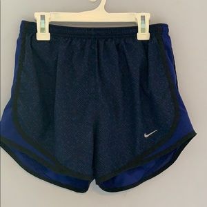 blue patterned nike dri-fit athletic shorts